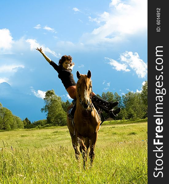 Woman and horse blue sky