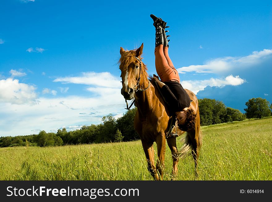 Woman and horse blue sky