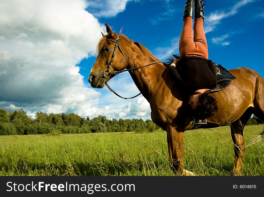 Woman and horse blue sky