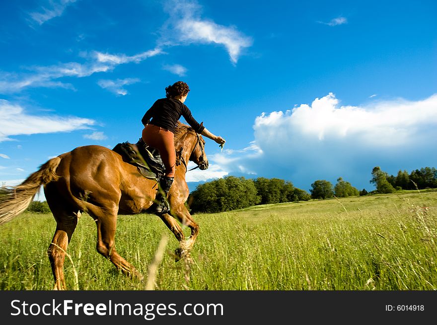 Woman and horse blue sky