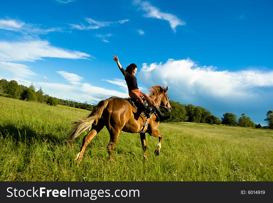 Woman and horse blue sky