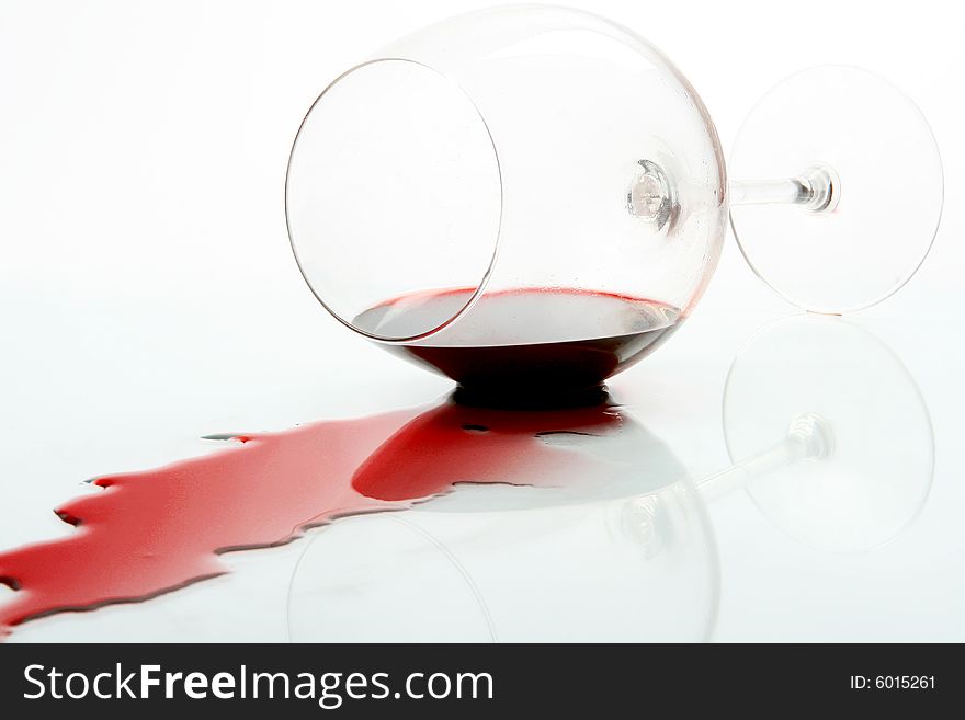 Wine glass with red wine falled down. Wine glass with red wine falled down
