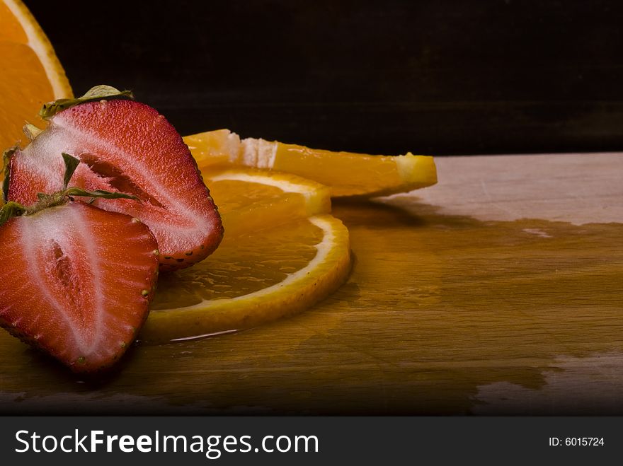 Fruit close up strawberry and orange