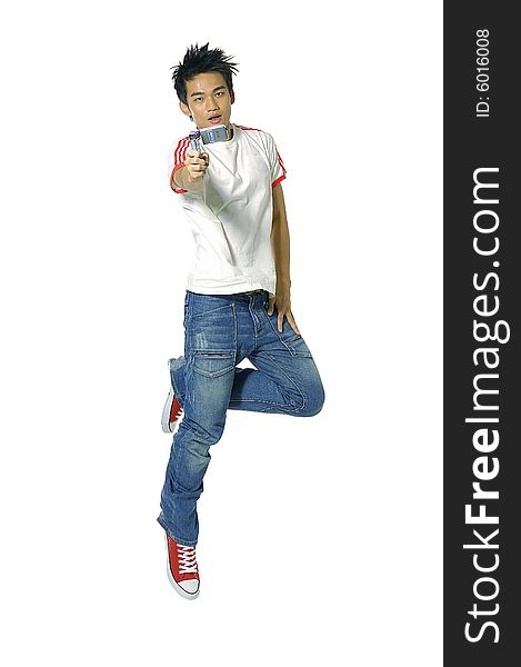 Young Asian man jumping, isolated in white