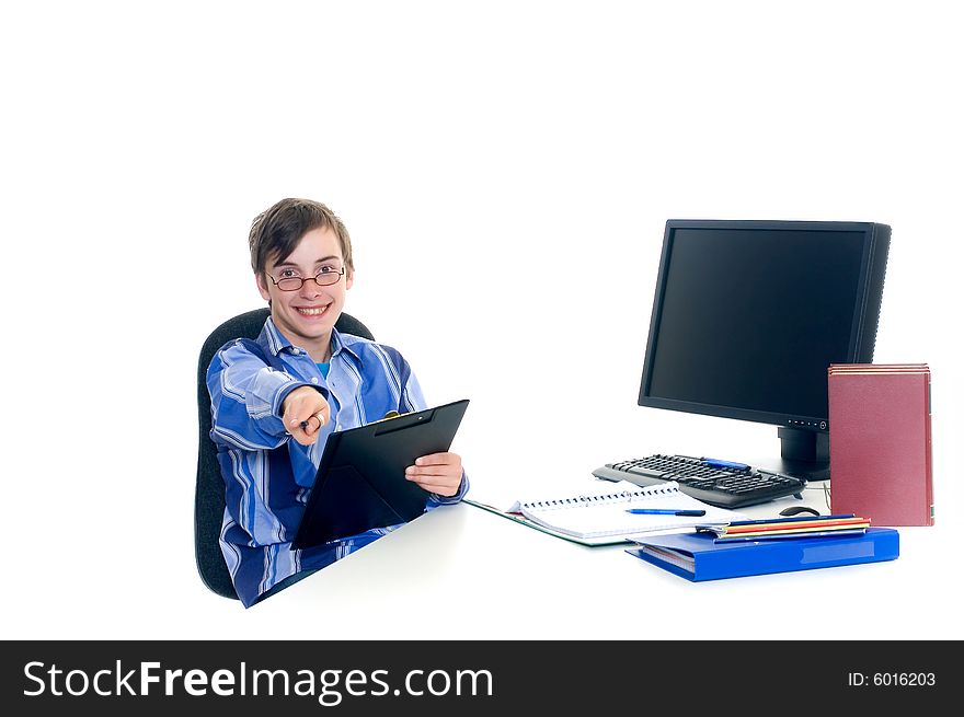 Teenager student doing homework with computer and books on desk, white background