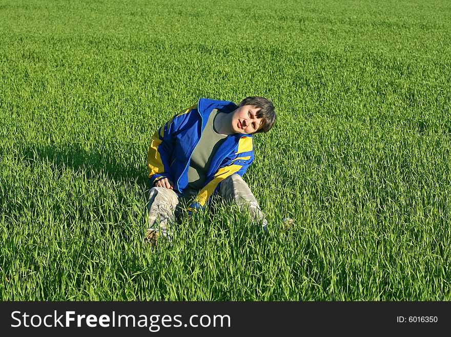 A woman have a rest on a field