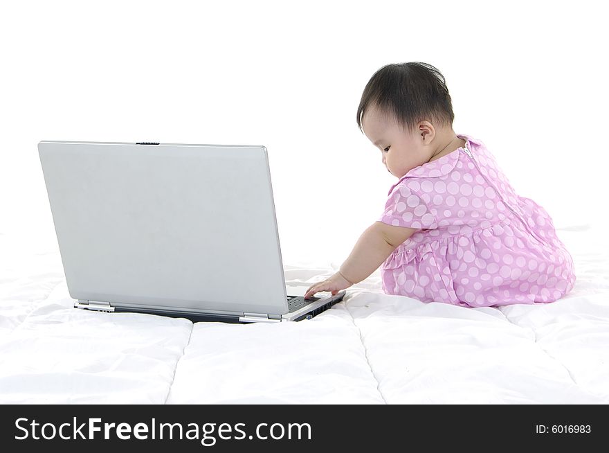 Small baby with laptop isolated. Small baby with laptop isolated