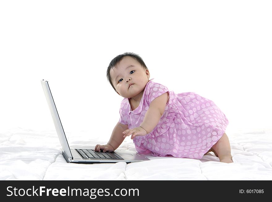 Small baby with laptop isolated. Small baby with laptop isolated