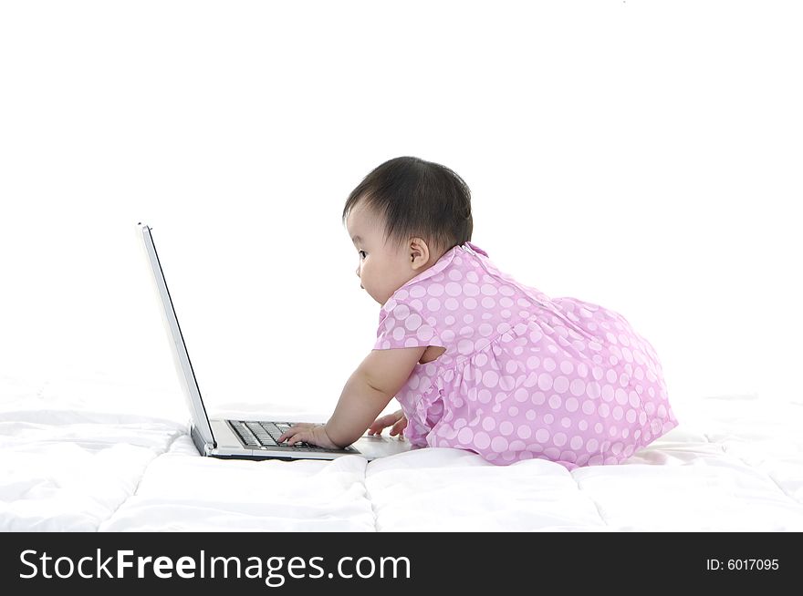 Small baby with laptop isolated. Small baby with laptop isolated