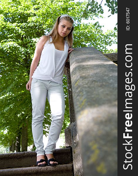 Portrait of young girl on forest background