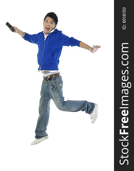 Asian young adult jumping in the air