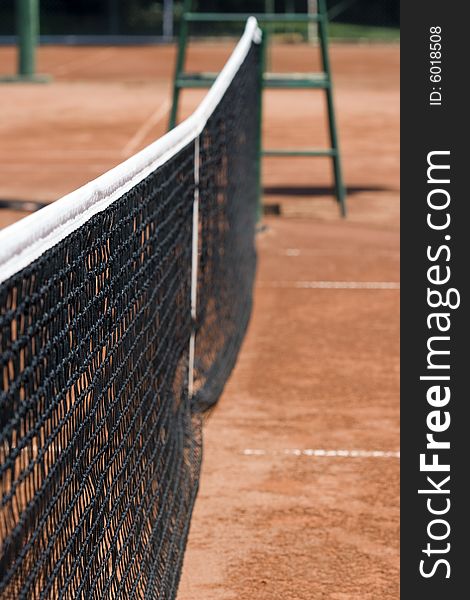Tennis Net On The Tennis Clay Court