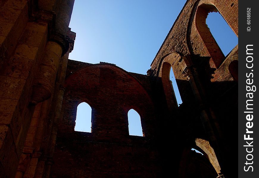 A wonderful shot of a glimpse of the uncover abbey of San Galgano in Tuscany