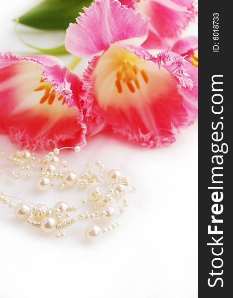 Pink tulips and pearlnecklace, engagement concept