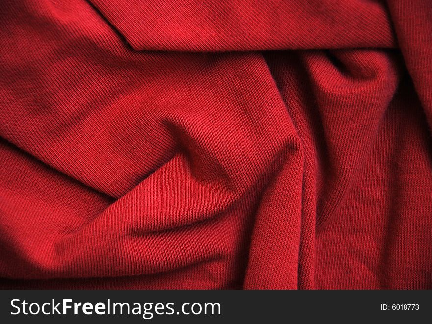 A detail of a red fabric. A detail of a red fabric