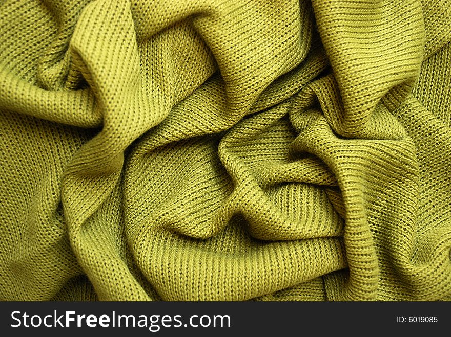 A detail of a green sweater