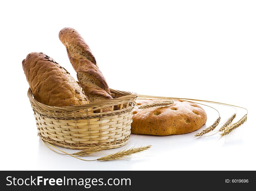 Various fresh baked goods with ears of wheat. Various fresh baked goods with ears of wheat