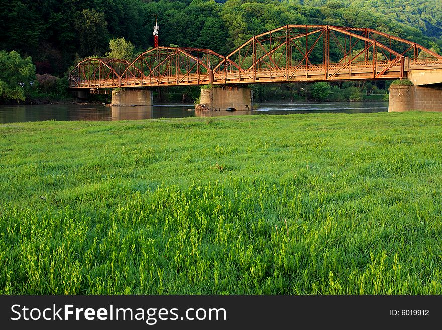 Old metal bridge over Mures River, Romania