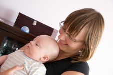 Mother With Newborn Smiling Stock Photo
