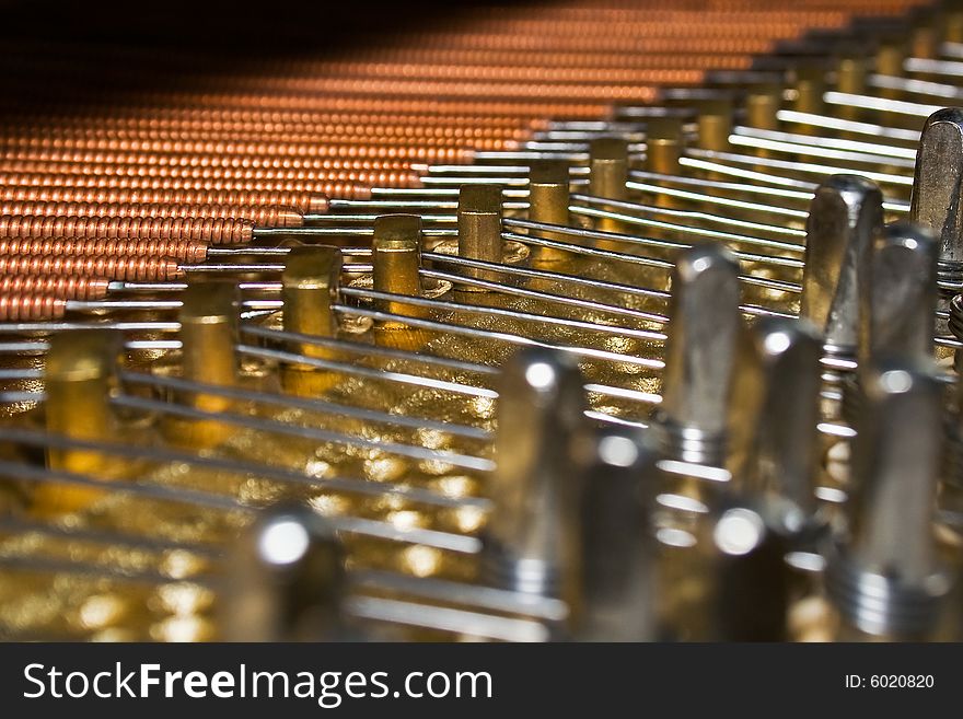 Interior of a piano, wires close-up. Horizontal shoot. Interior of a piano, wires close-up. Horizontal shoot