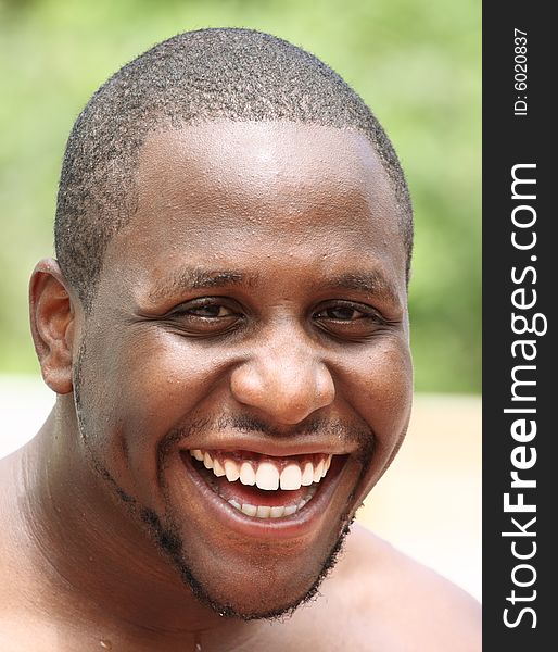 Young African American Male Laughing.