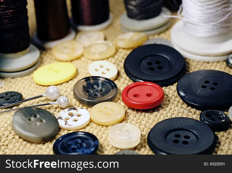 Several sewing material spread over the table.