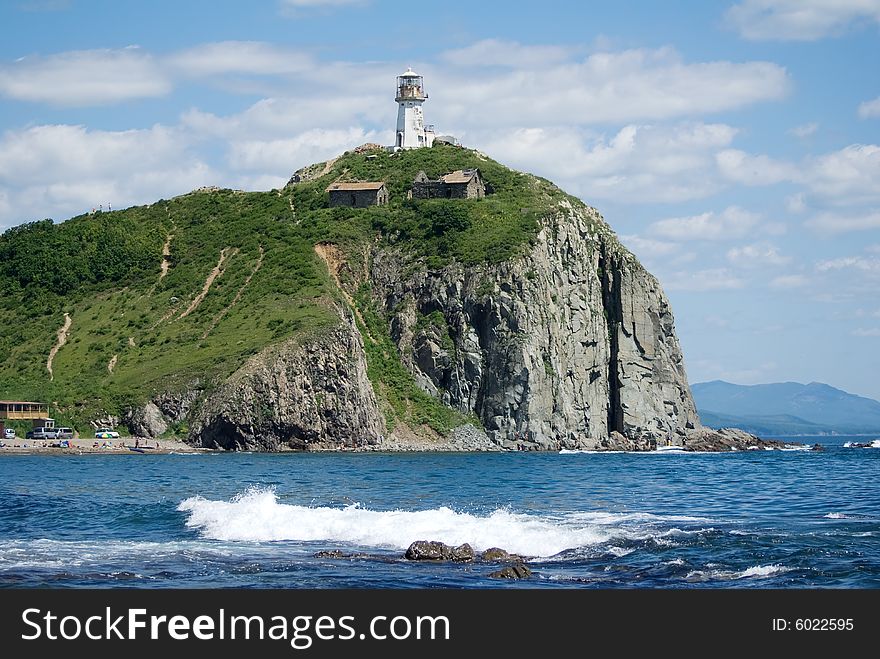 Beacon on a rock on coast of sea of Japan