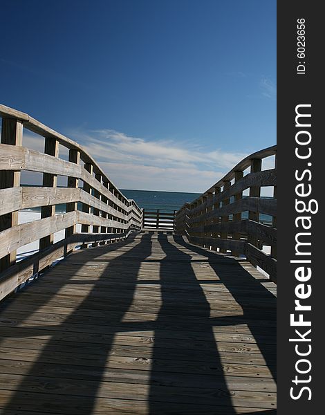 A boardwalk leading to a beach