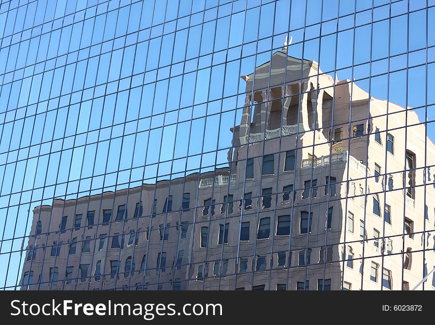 Building reflection in another building. Building reflection in another building