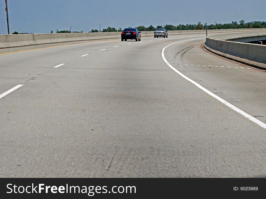 Freeway turning right over the swamp in New Orleans.