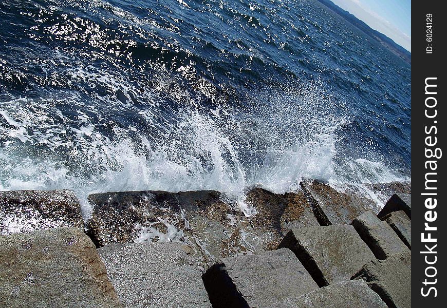 Water spray on cement blocks.