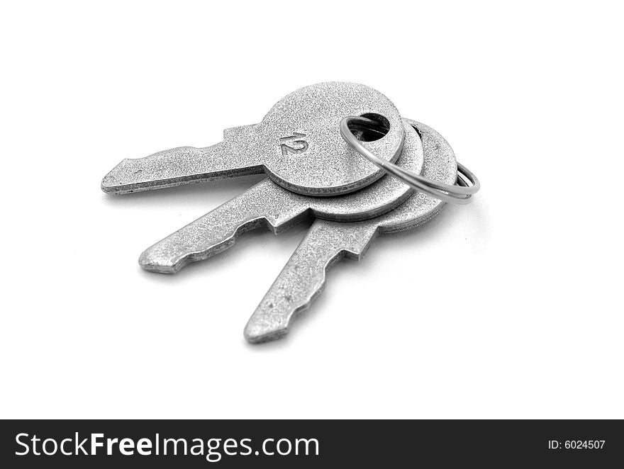 Steel keys on white background