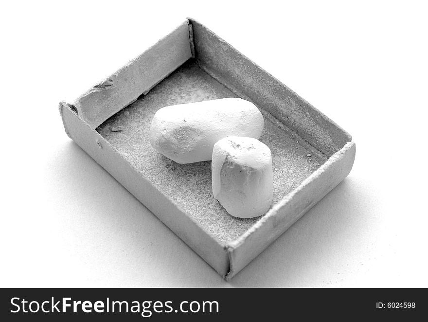 Isolated chalk in box on white background