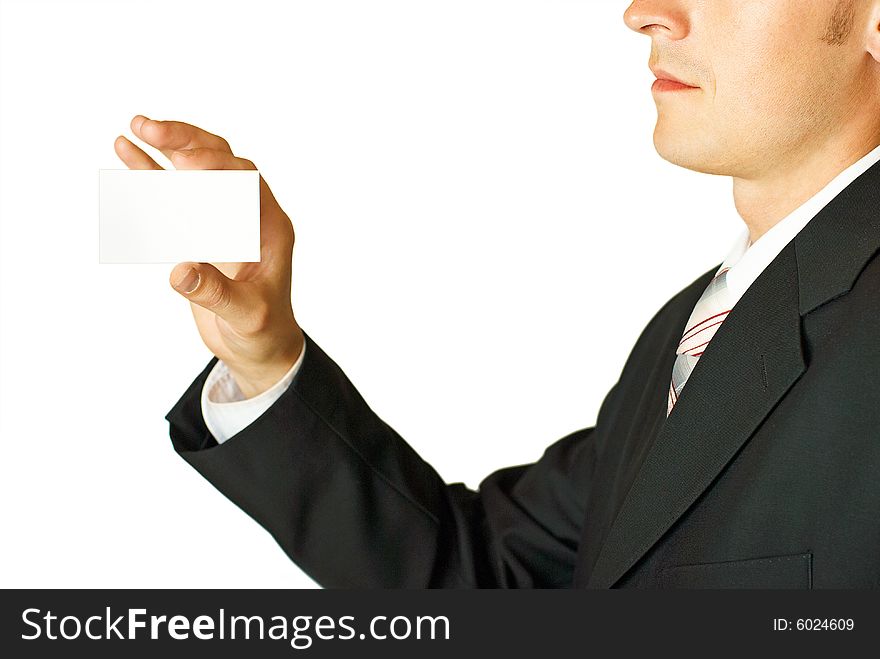 Young businessman holding blank card