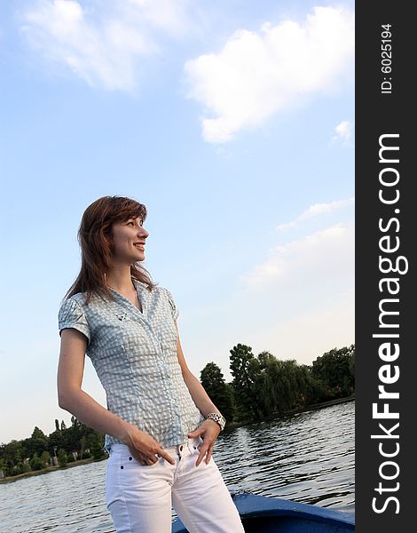 Girl Standing On The Boat