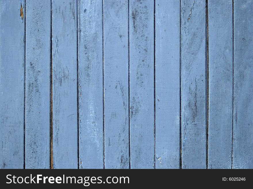 Close up of an fragment of an old blue door