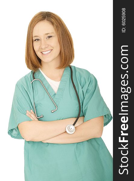 Tilted shot of isolated woman doctor or nurse folding hand and smiling to camera. Tilted shot of isolated woman doctor or nurse folding hand and smiling to camera