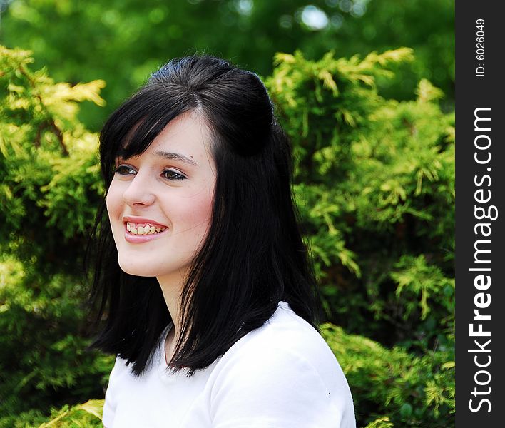 Beautiful dark haired teen girl on a sunny day. Beautiful dark haired teen girl on a sunny day