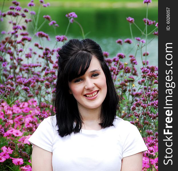 Beautiful dark haired teen girl on a sunny day. Beautiful dark haired teen girl on a sunny day