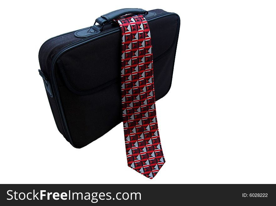 Black bag and red tie isolated on the white background