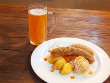 Sausages With Vegetables And Mug With Beer Stock Photo Sausages With Vegetables And Mug With Beer Stock Photo