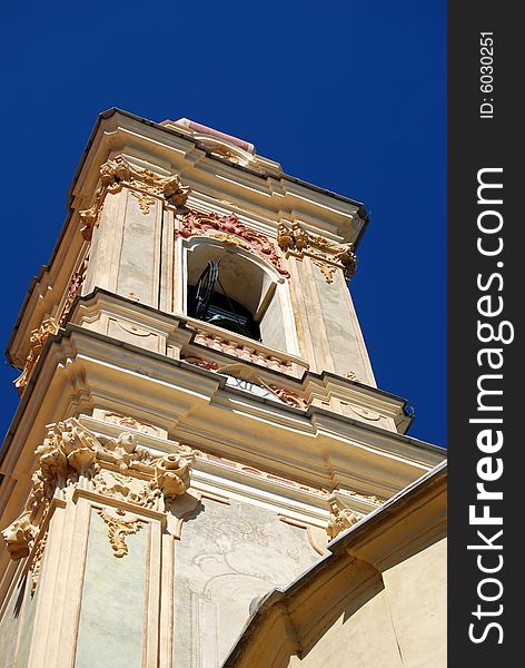 Bell tower of the Corallini's Cathedral in Cervo, a medioeval village in Liguria, Italy.