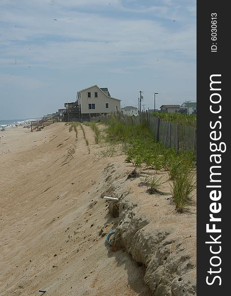 A view along the dunes of a North Carolina beach area. A view along the dunes of a North Carolina beach area