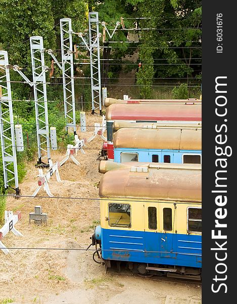 High angle view of old trains abandoned in old railway side track or siding. High angle view of old trains abandoned in old railway side track or siding.