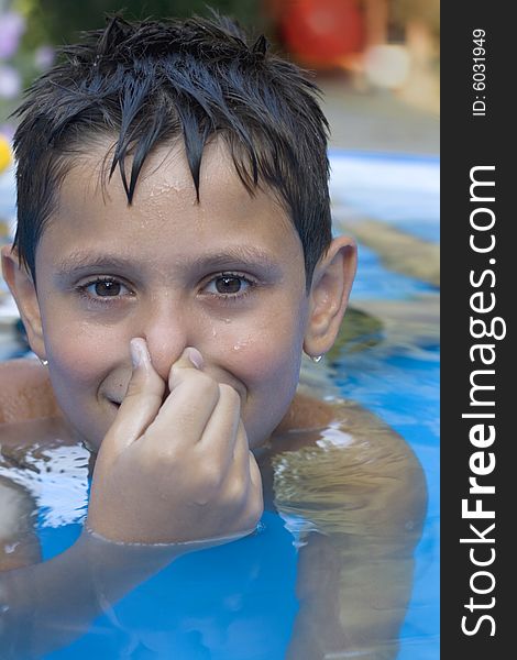 Young boy in pool