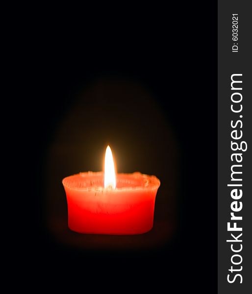 Fire Candle On Black Background