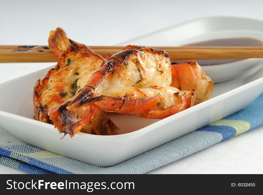 Shrimp grilled to perfection with garlic dipping sauce. Shrimp grilled to perfection with garlic dipping sauce.