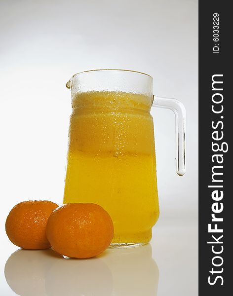 Pitcher of orange juice made from Asian ponkan. Pitcher of orange juice made from Asian ponkan