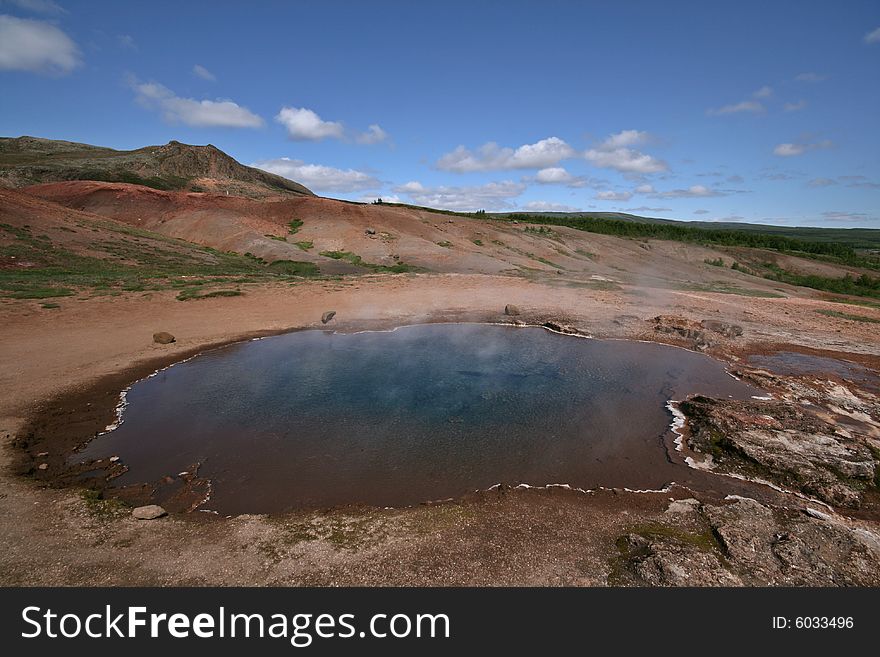 Clear lagoon on a geothermal field. Clear lagoon on a geothermal field.