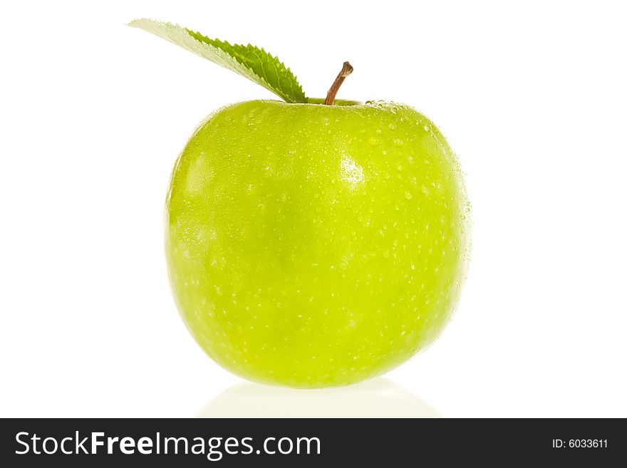 Fresh green apple isolated on white with water droplets